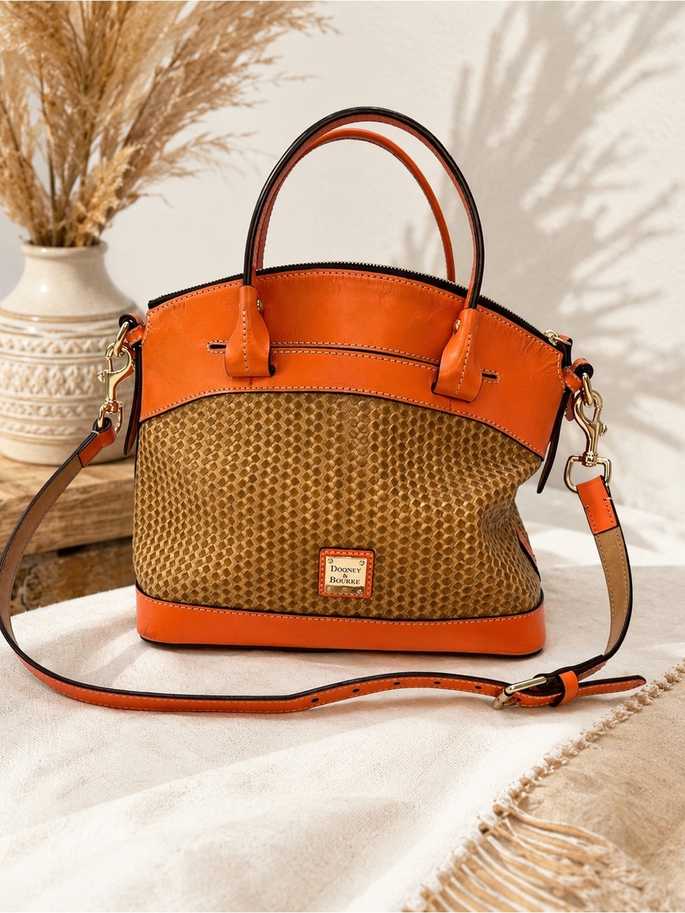 Dooney & Bourke Coral and Brown Beacon Leather Domed Textured Satchel